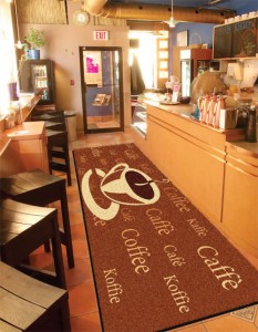 A custom printed carpet mat in a coffee shop